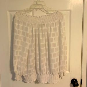 Off the shoulder day or night blouse.